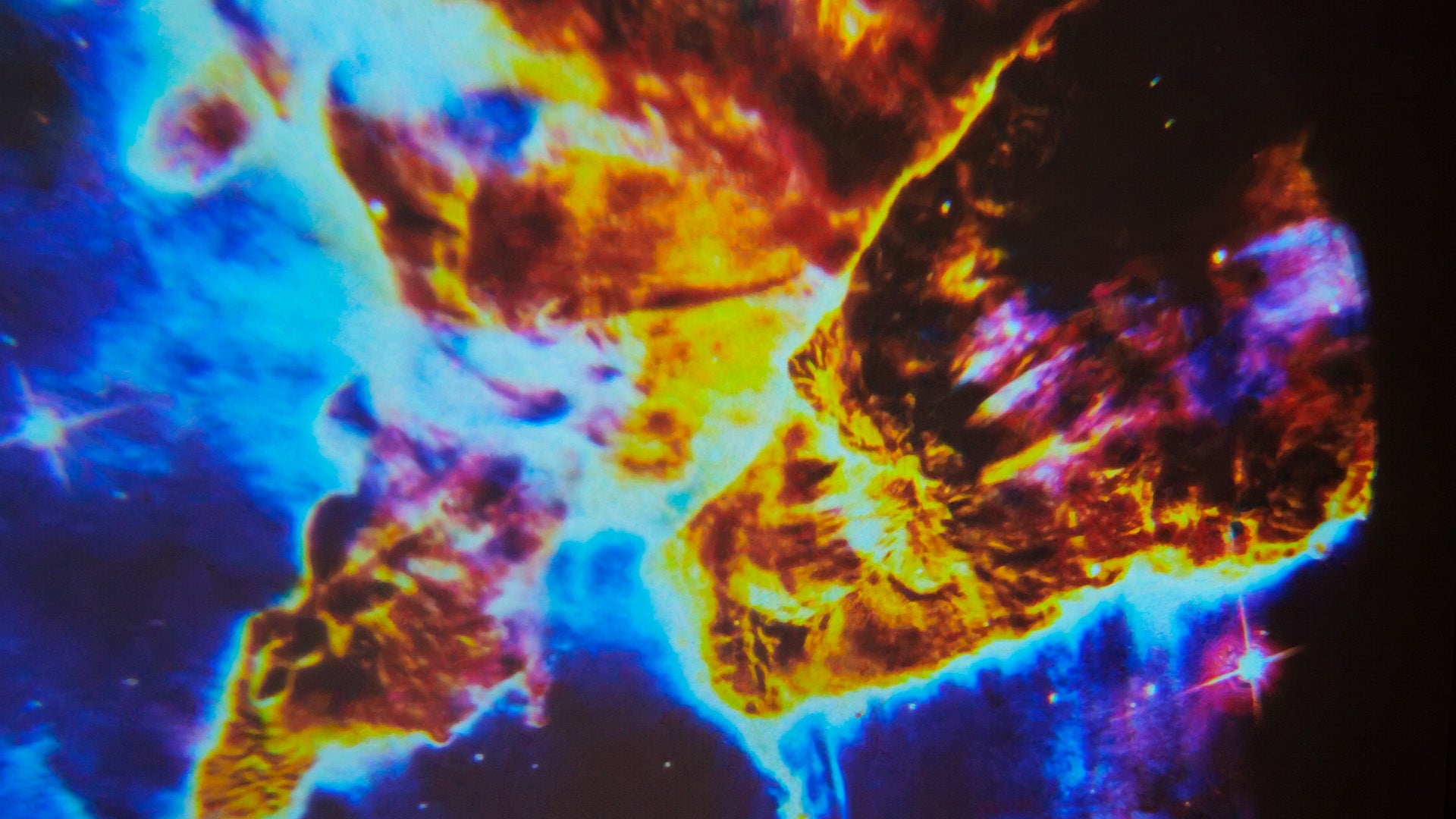 NoVa Planetarium Projector with adjustable brightness and color settings, featuring 12 high-definition effects including stars, nebulas, and galaxies, perfect for creating a celestial atmosphere at home