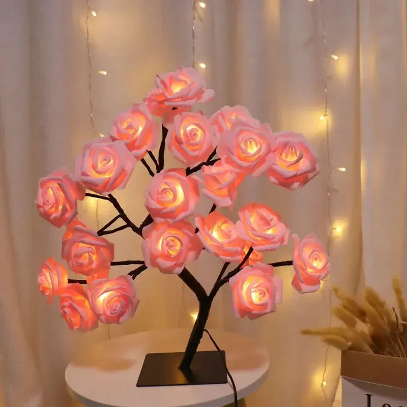 NoVa Premium Illuminated Tree Lamp with various illuminated leaves and roses in different colors.