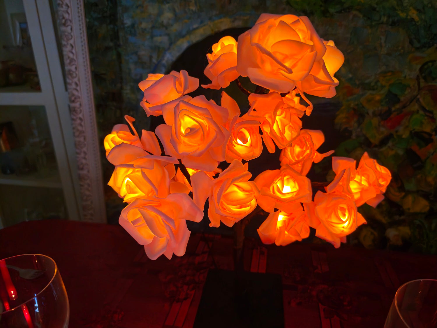 NoVa Premium Illuminated Tree Lamp with various illuminated leaves and roses in different colors.