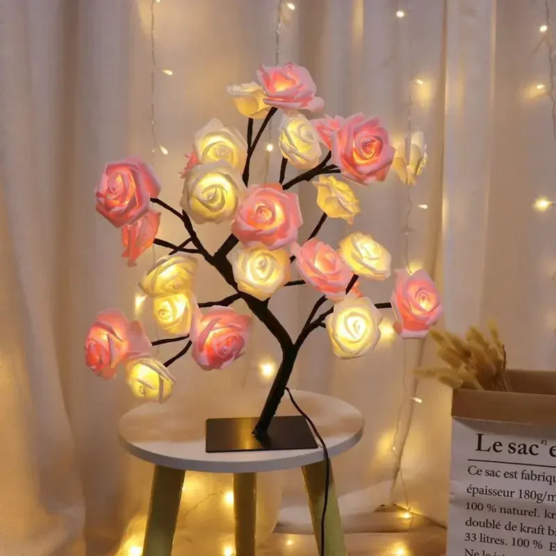NoVa Premium Illuminated Tree Lamp with various illuminated leaves and roses in different colors.