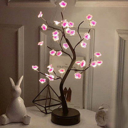 NoVa Illuminated Tree Night Lamp featuring various illuminated leaves including autumn leaves, yellow roses, light ball leaves, and colorful roses, perfect for creating a magical atmosphere