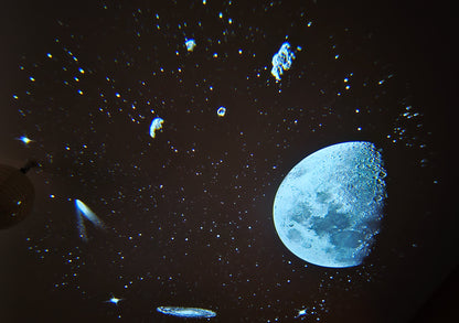 NoVa Planetarium Projector with adjustable brightness and color settings, featuring 12 high-definition effects including stars, nebulas, and galaxies, perfect for creating a celestial atmosphere at home